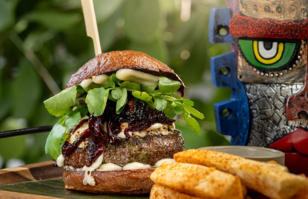 Arcano's Wagyu Burger, Hibiscus Onions, Blackberry Bun, Aioli, Queso Fresco, Yuca Fries