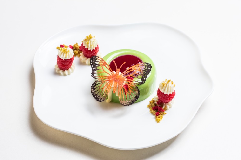 The Butterfly, yuzu mousse, raspberry compote, pistachio sablé