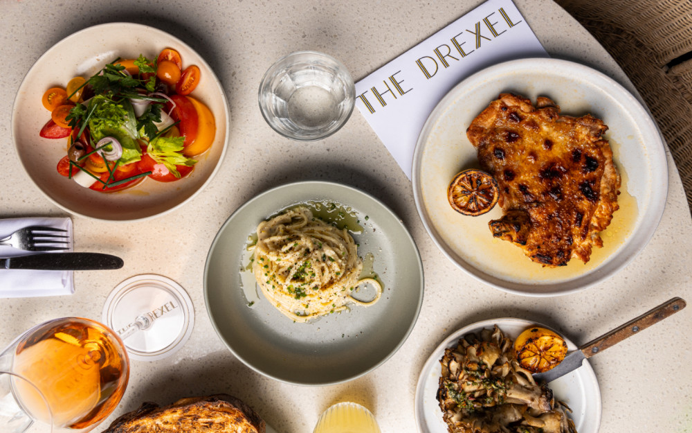 Savor coastal flavors at The Drexel—fresh pasta, grilled chicken, and vibrant salads in the heart of Miami Beach’s historic Española Way.