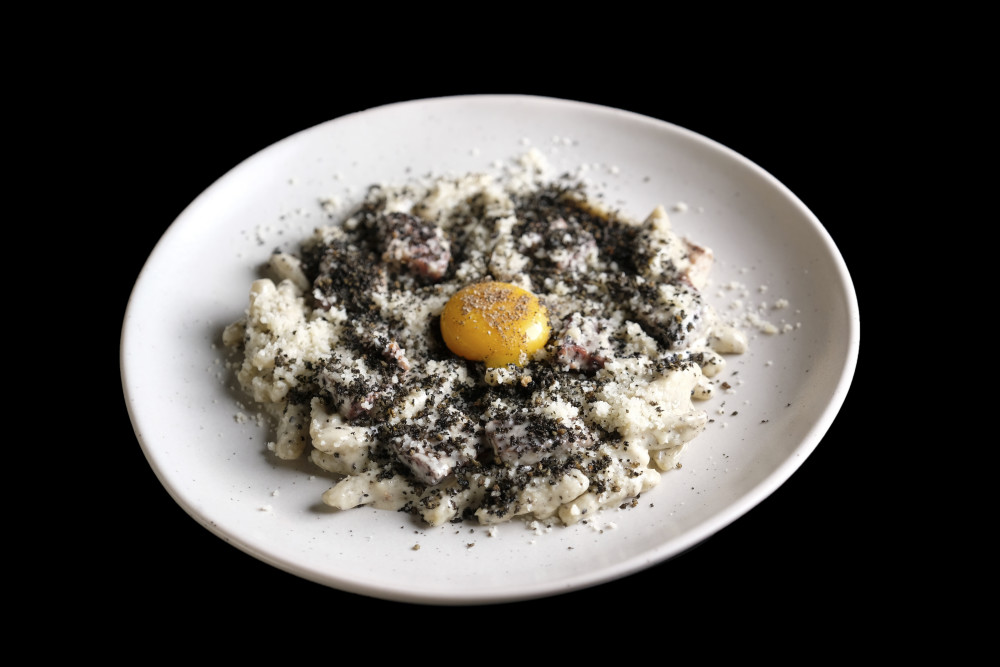 Made with Egg Yolk, Breadcrumbs, Heritage Bacon & Black Truffle.
