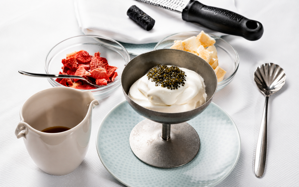 Creamy caviar ice cream with toppings