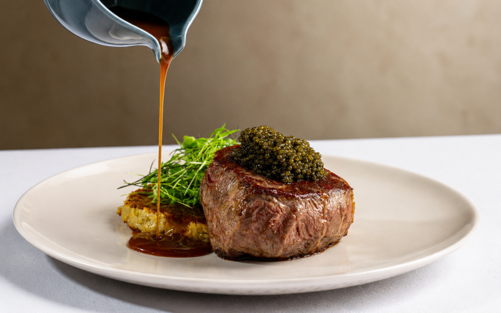 Ribeye topped with private label ossetra caviar