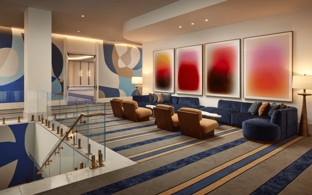 Pearl Gallerie lounge with colorful art and soft seating for pre-function gatherings