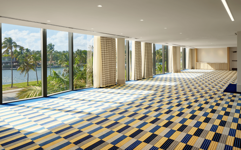 Shore Meeting Room showcasing expansive windows and flexible conference setup