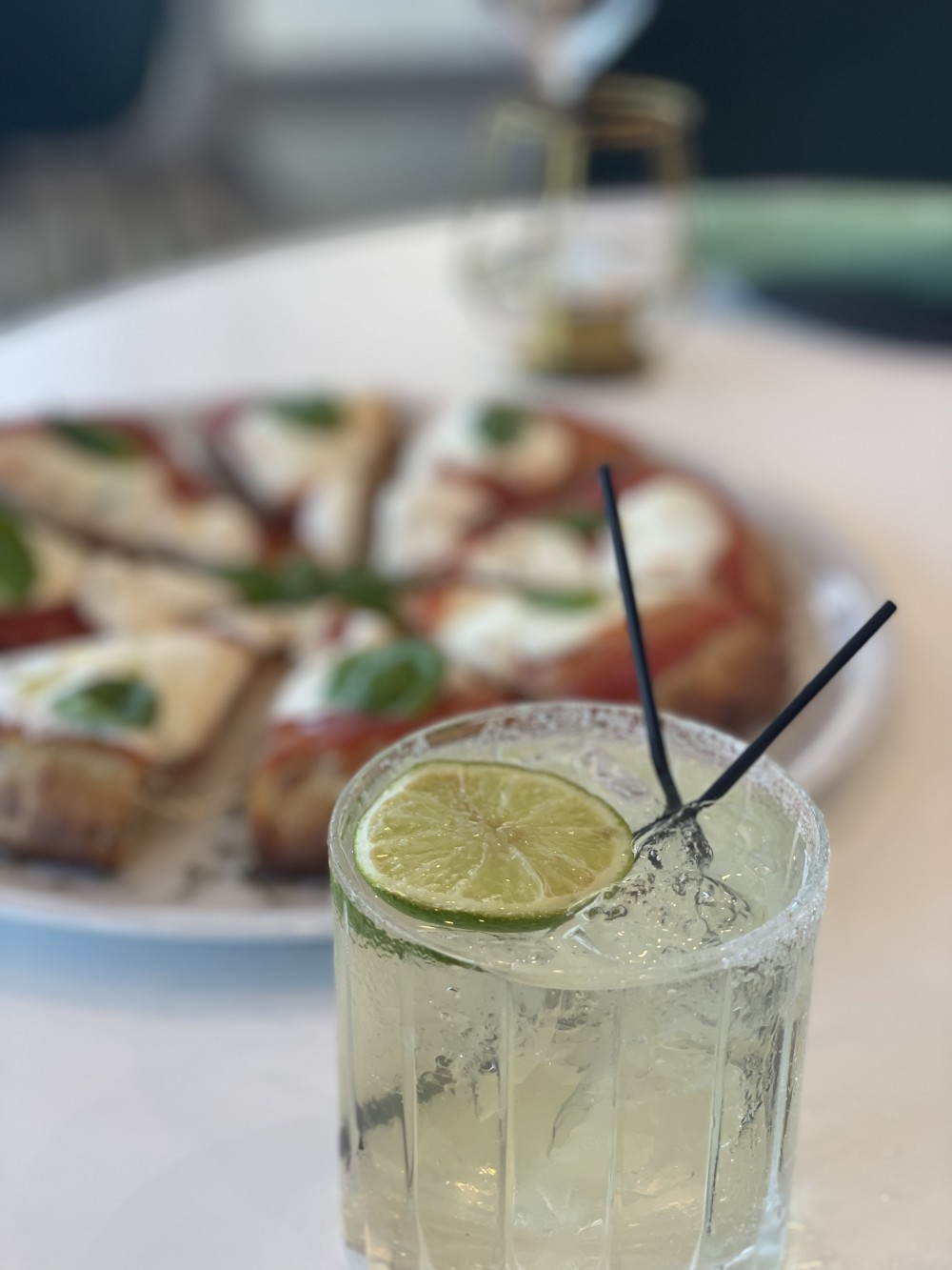 Cocktail and pizza