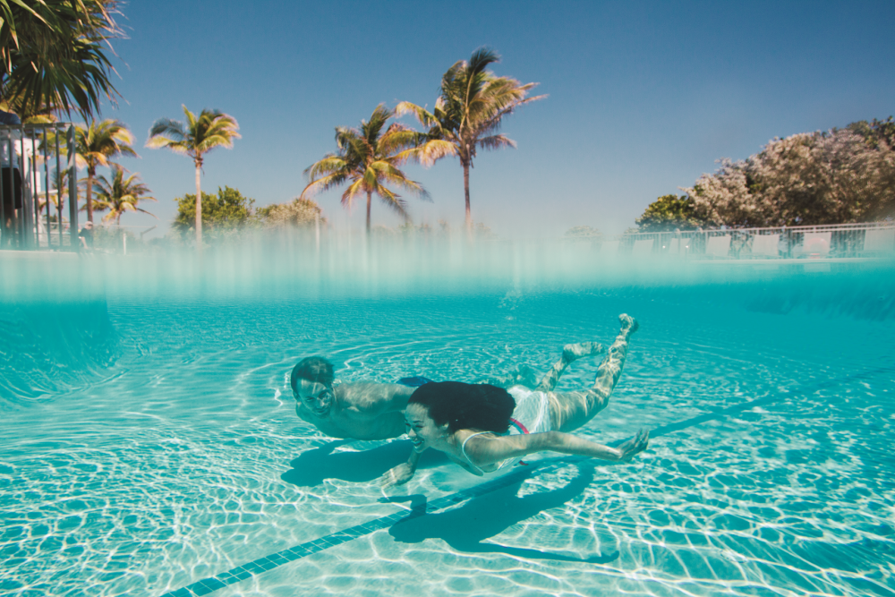 Located just a few yards away from the beach, the Community Center pool is open to Surfside hotel guests and residents. Image courtesy of Jacober Creative for Visit Surfside.