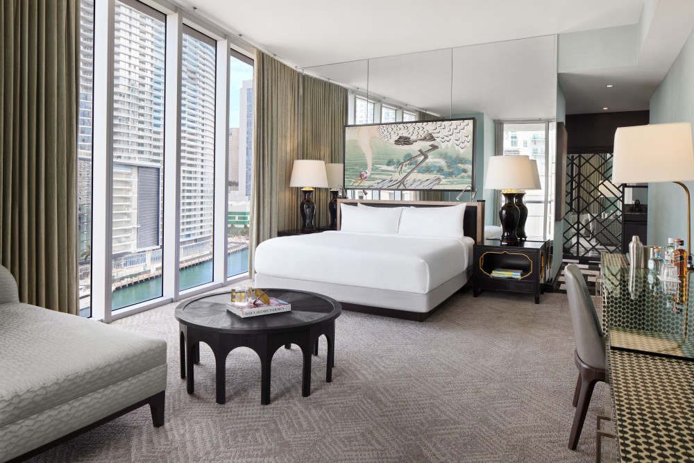 Gaze upon the bright lights and glam of Miami. The Cool Corner is a 588-square-foot, city-facing corner room featuring a private balcony and more.
