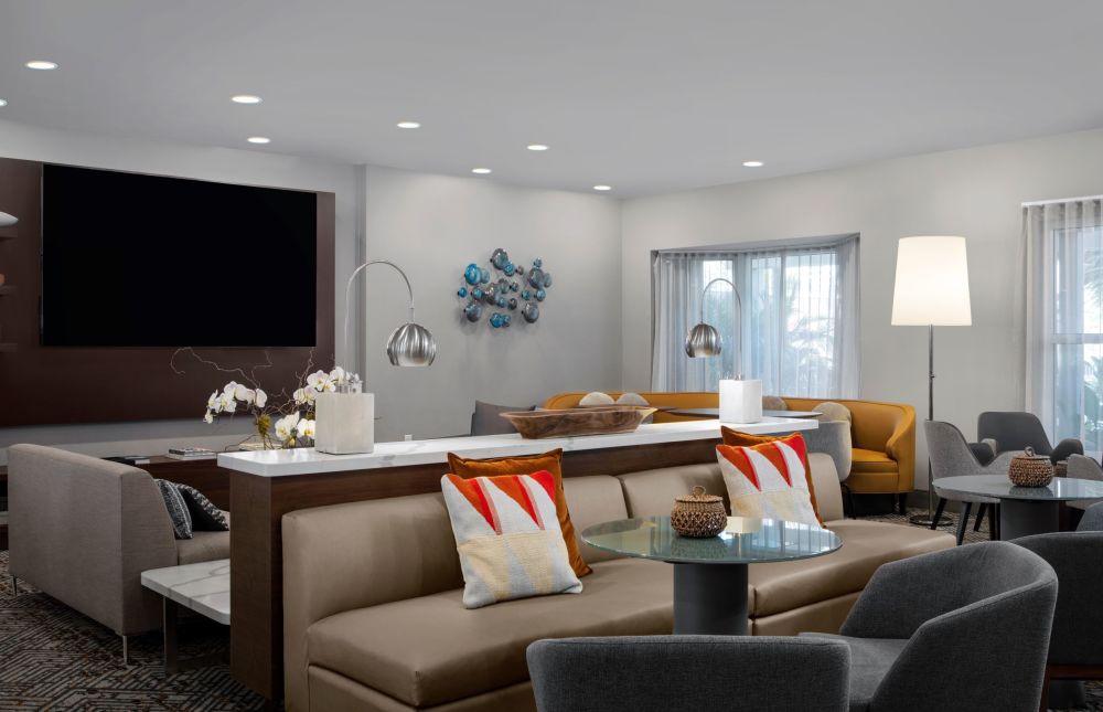 Our hotel features a Home Theater area with four 46" TVs and ample seating, where you can catch a game or stay updated with the latest news.