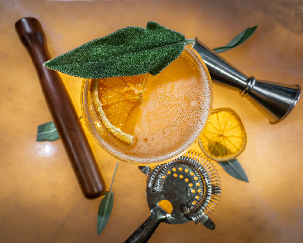 Scotch, sherry, spiced pear liqueur, berry tea.