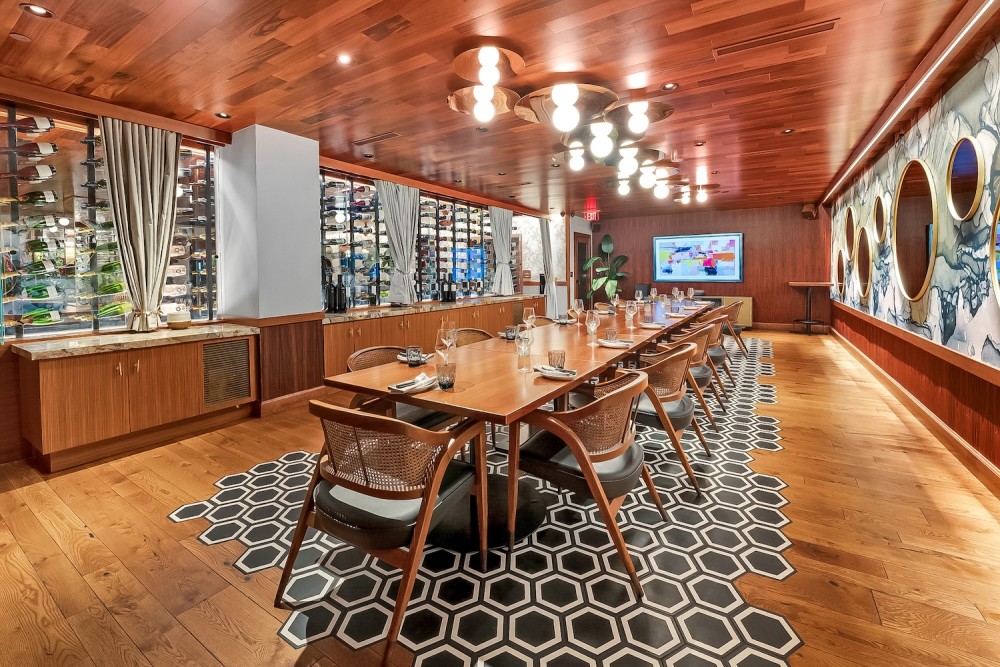 Private dining for 10–35 seated guests featuring built-in audiovisual capabilities, flexible layouts, and an elegant setting for any occasion.