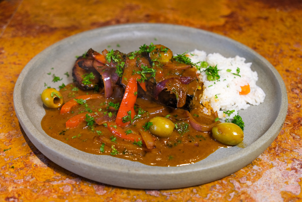 brisket, peppers & olives sofrito, plantains, rice & beans