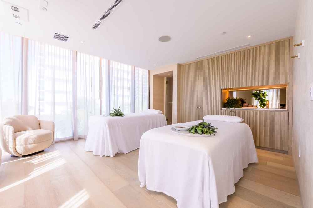 Enjoy a luxurious side-by-side experience in our serene, private couple’s suite
