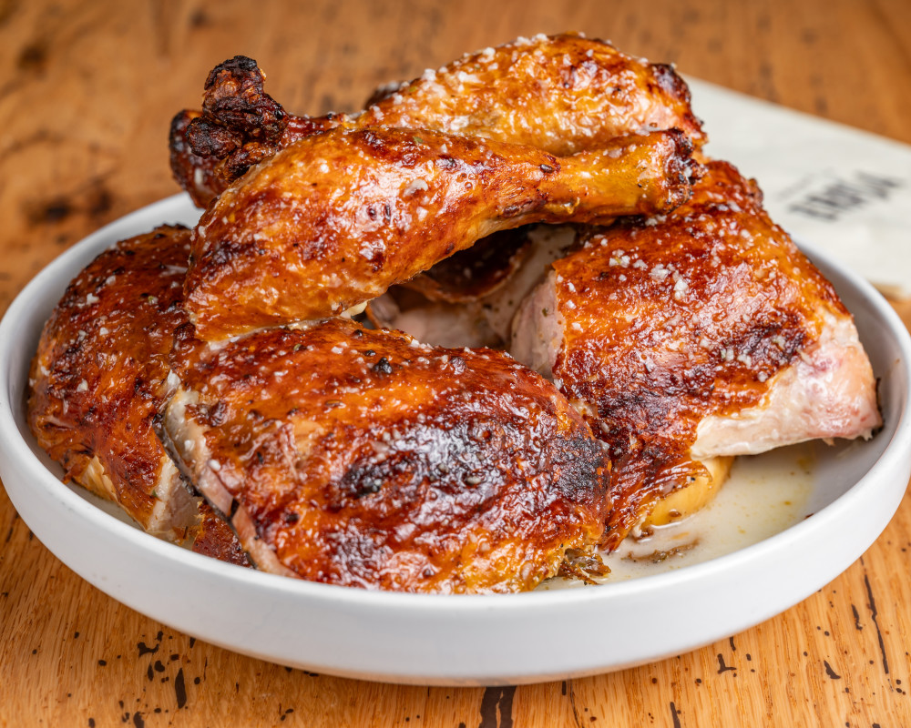 Juicy rotisserie chicken, marinated to perfection and finished with our signature garlic mojo.