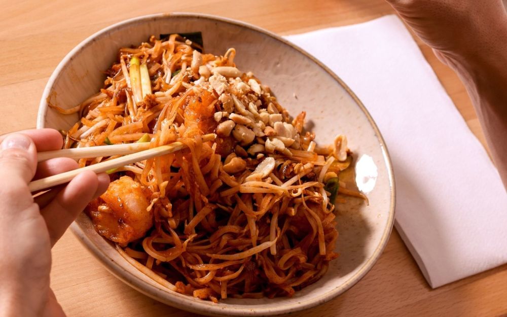 Pad Thai with shrimp, crunchy peanuts, and fresh sprouts—tangy, savory, and perfectly stir-fried for that authentic street-food flavor.