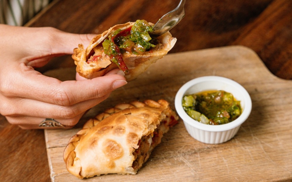 Beef Empanada with homemade chimichurri.