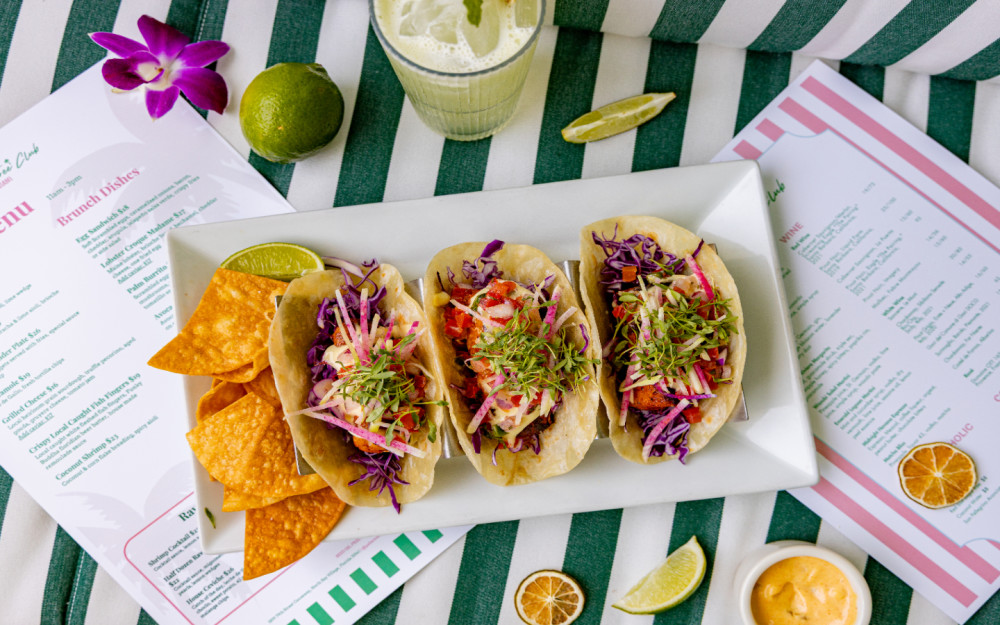 Fish tacos, but make it Palm Tree—fresh, vibrant, and ready to share. This is how Miami does flavor. You in?