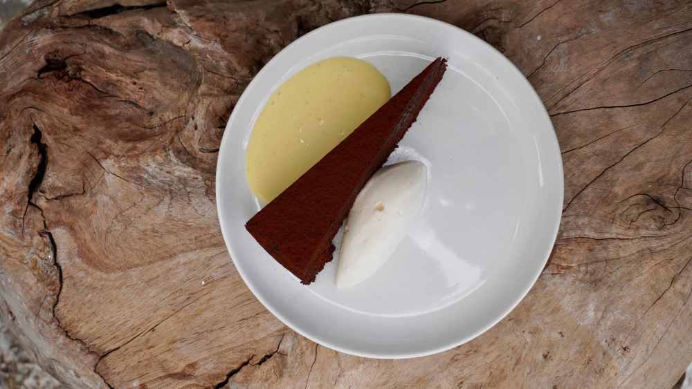 Flourless Chocolate Torte
 orange creme anglaise, Grand Marnier soft cream