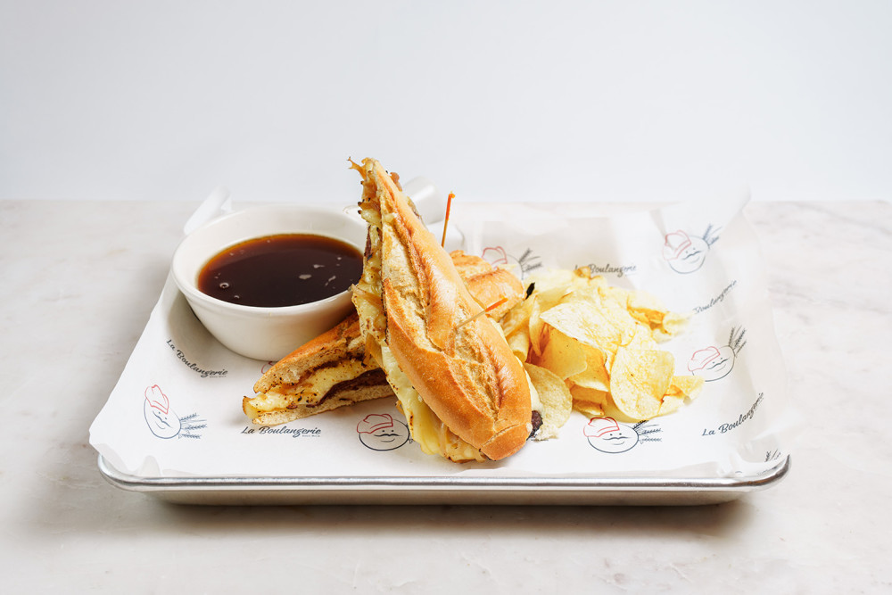 (HOT) Baguette Bread, Roast Beef, Swiss Cheese & Caramelized Onions, “au jus” dip sauce