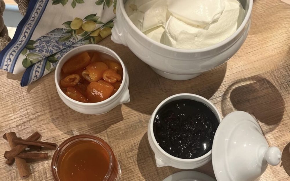 Served with orange, raisins, sour cherry preserves
