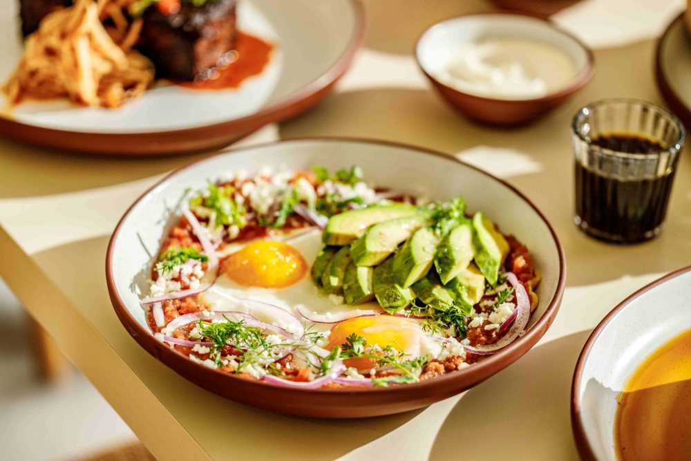 salsa roja, sunny side up eggs, queso fresco, tortilla