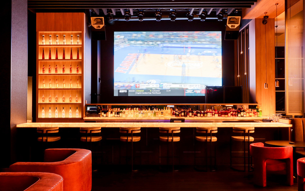 Alluring atmosphere with chic décor, plush seating, and captivating lighting.