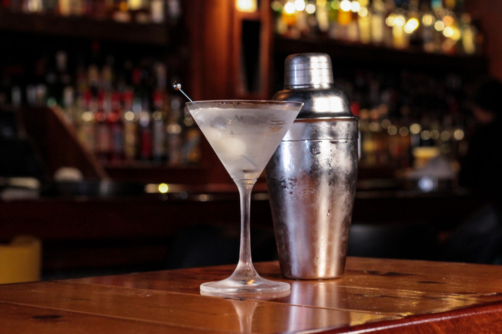 Our house cocktail, the Gibson is a martini style drink with gin or vodka, vermouth, sherry, onions