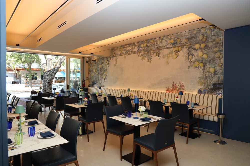 The heart of the restaurant – where coastal charm meets cozy elegance.
