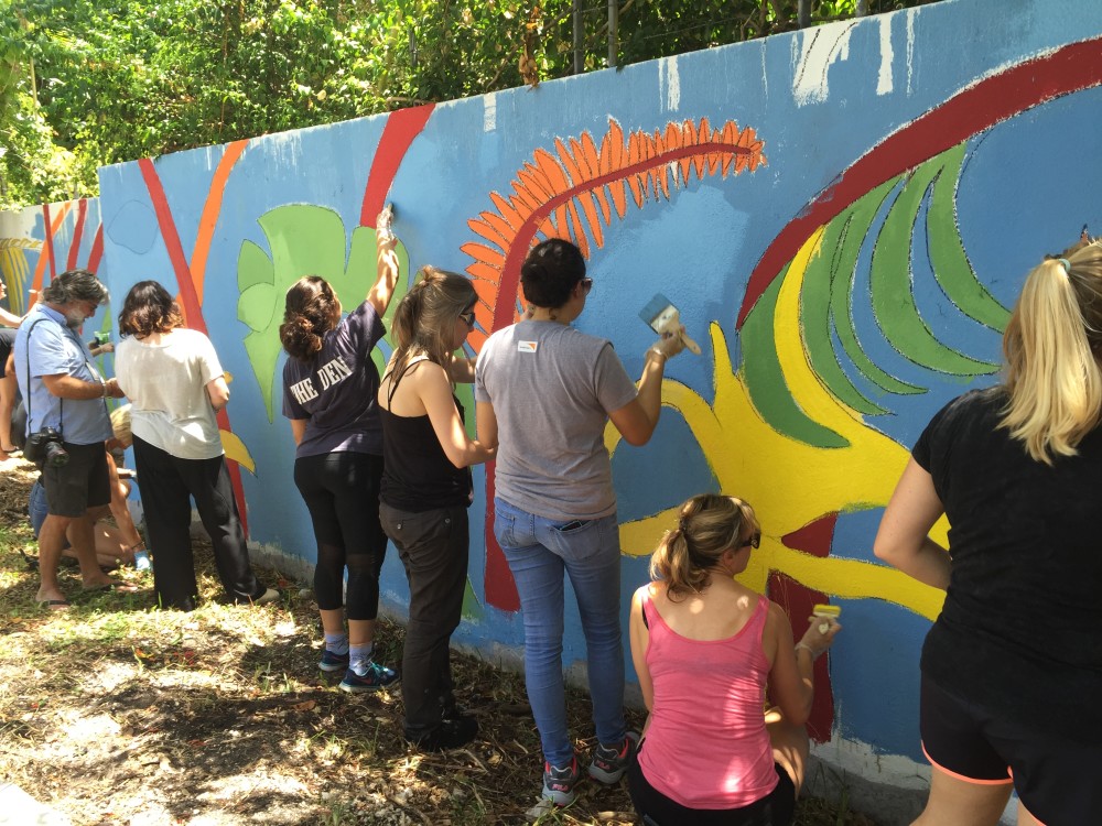 ArtSouth conducts mural paintings in the South Miami community as part of an effort to rejuvenate empty walls. Global Ties, South Miami residents, and ArtSouth staff and artists helped to finish the bulk of the mural located at Murray Park in South Miami.