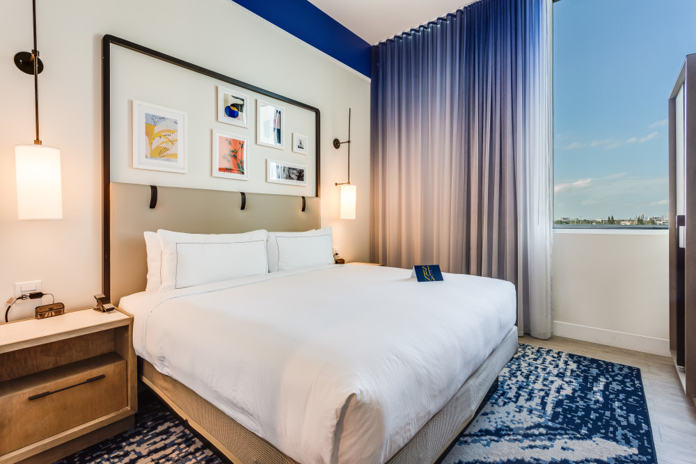 Our contemporary decor rooms offer an array of amenities. Somo of the? 55" Smart TV, wood laminate flooring, complimentary WiFi, Espresso coffee maker and modern bathrooms with superior toiletries.