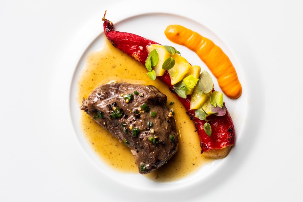 Iberico pork presa, cranberry bean fricassée, chili