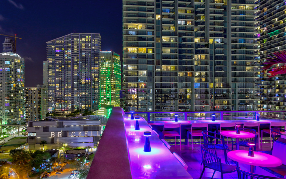 Rooftop seating area with a view of Brickell sky line