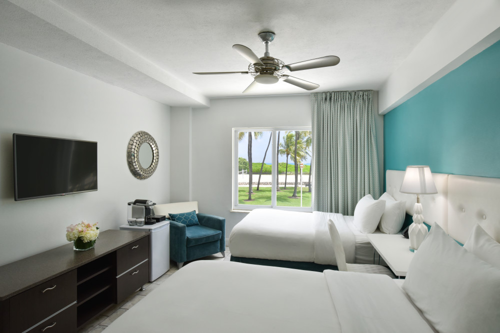 Deluxe Double Room with  2 full-sized beds 
TV
Complimentary Wi-FI
Luxury Linen and toiletries
In room beach chairs and beach towels
Robes
Safe
Iron and Ironing Board
Hairdryer
IHome radio-clock
Personalized temperature control
Nespresso Coffee Machine