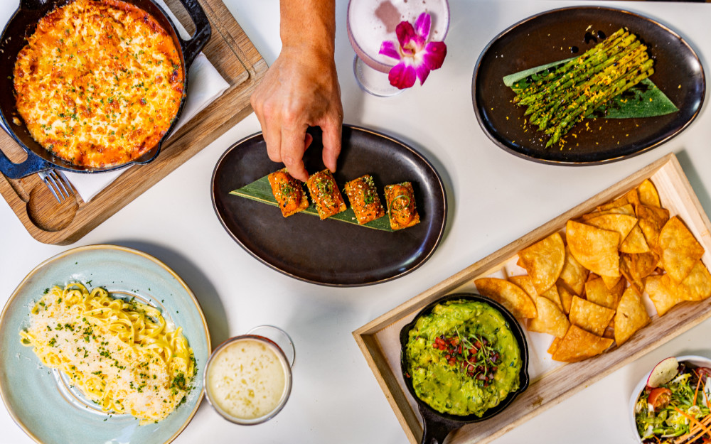 Fork it, dip it, grab it—this trio’s got range. From zesty pasta to crispy bites and guac dreams, Palm Tree Club’s got your cravings covered.