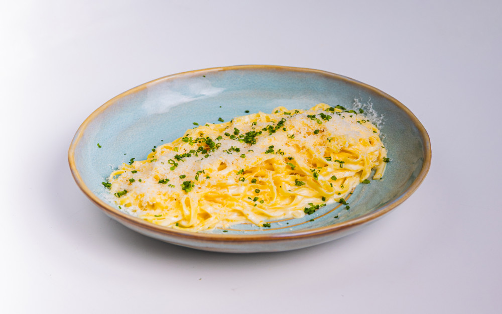 Lemon Fettuccine done right—bright, silky, and full of character. A Palm Tree Club classic that keeps it simple and seriously satisfying.