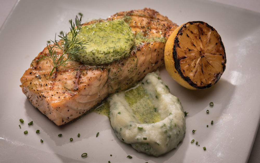 Chargrilled Salmon served with lemon dill butter and cauliflower mousse