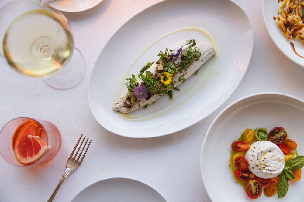 Steamed Branzino, Pantesca Sauce, Spinach, Microgreens