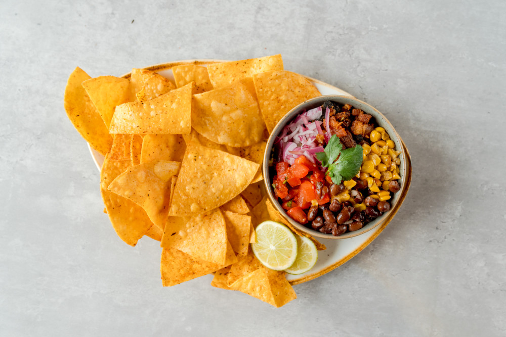 Bacon, black beans, corn, pico, cotija, tortilla chips.