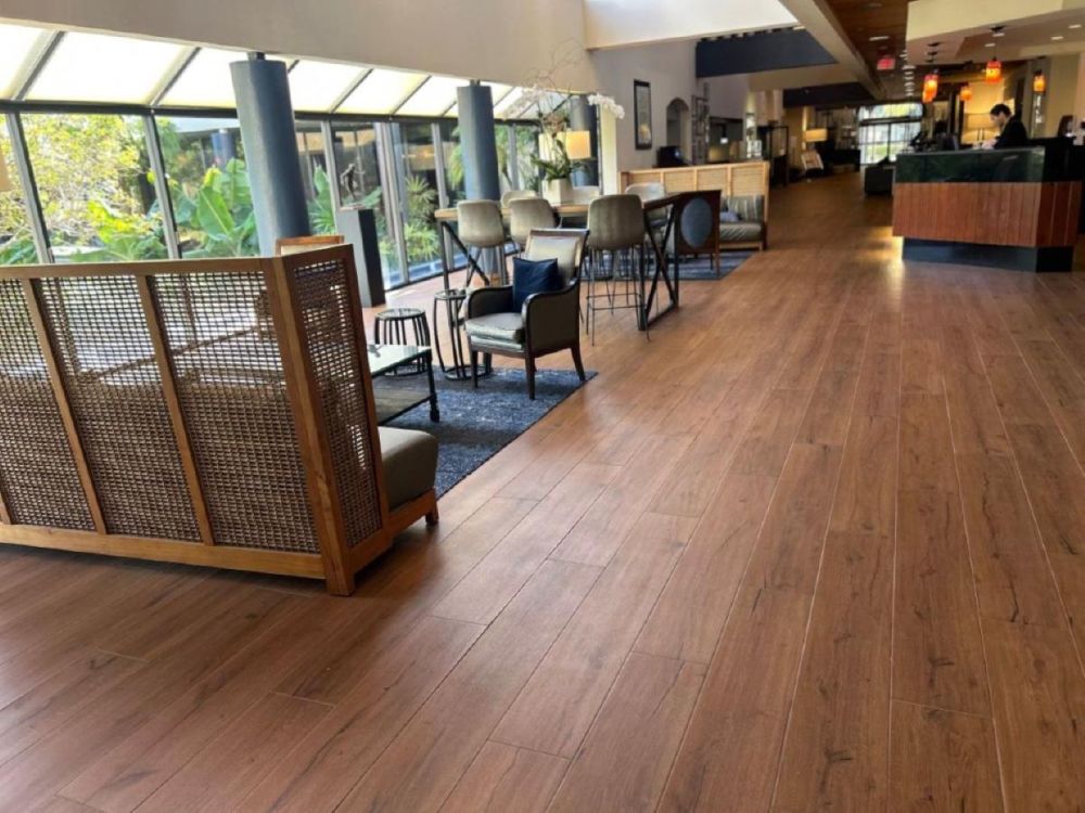 Wide-open renovated hotel lobby with expansive views to our lagoon and courtyard