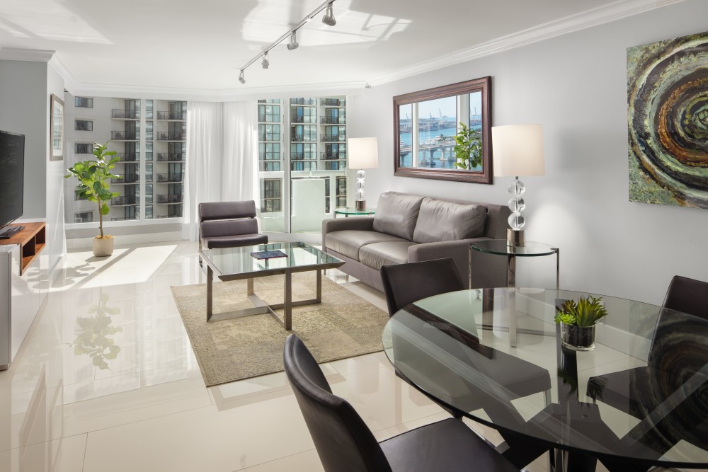 Our One Bedroom Condo features a separate bedroom, full sized kitchen with washer/dryer and balcony