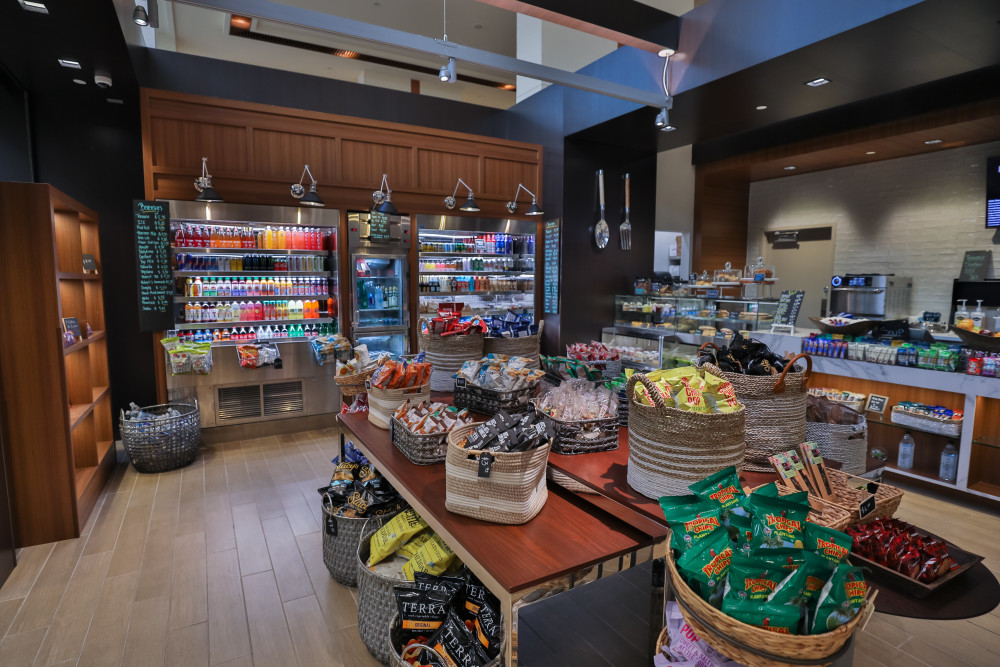 When you are on the go, Herb N' Kitchen will deliver an exceptional experience. Offering a range of healthy and delicious options featuring seasonal soups and salads, fresh artisanal sandwiches and flatbread pizzas for a quick bite. Our barista bar offers specialty Starbucks coffee to enjoy on the go and freshly baked goods.