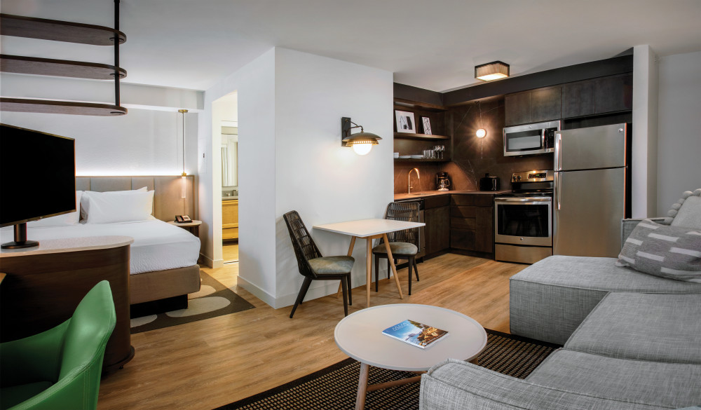 Spread out and enjoy our spacious studio suites. Stay productive with complimentary Wi-Fi, a full kitchen and cozy living area.