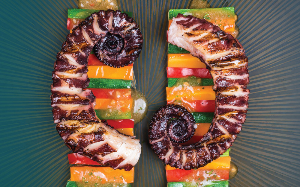 Grilled octopus marinated in oriental spices, served with sauteed vegetables
and ponzu sauce.