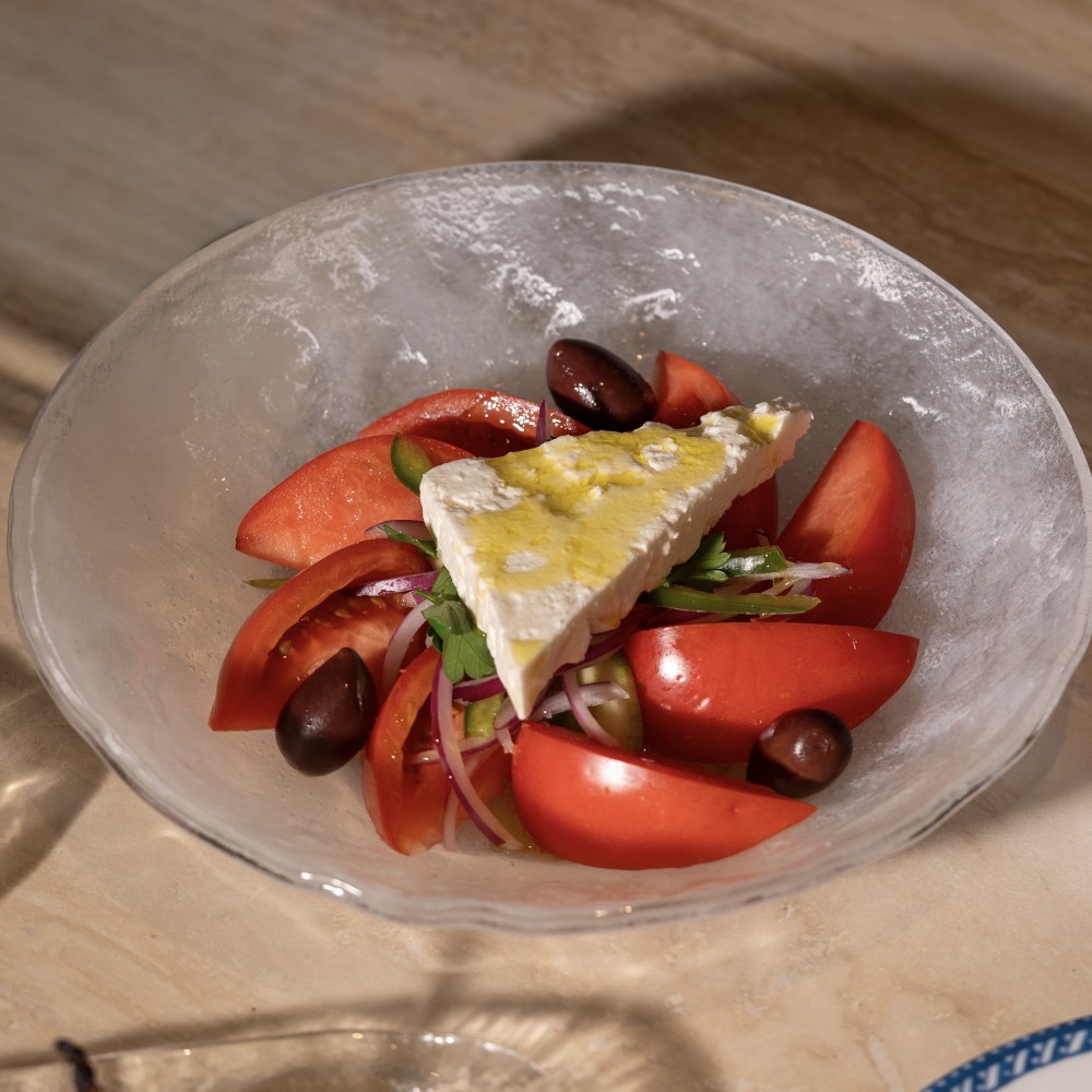 vine ripened tomatoes, green peppers, cucumber, feta, onions, olives