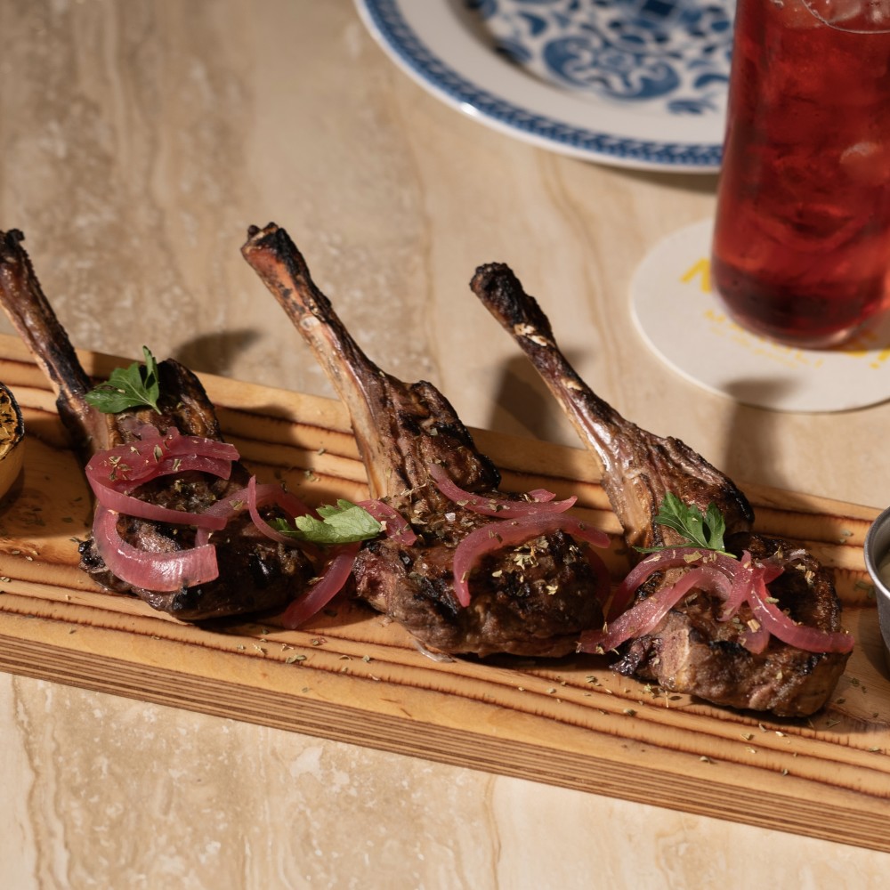 Greek-style lamb chops, pickled onions, served with tzatziki