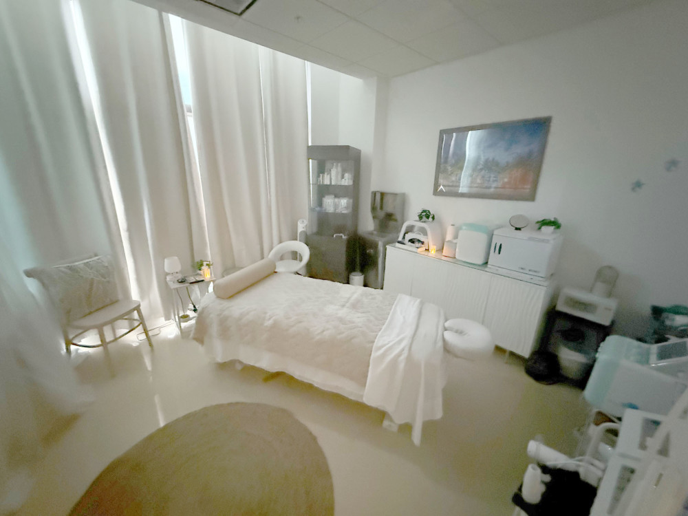 Each of our six spacious treatment rooms are themed for a specific neighborhood in Miami; this is our Miami Beach massage & facial room