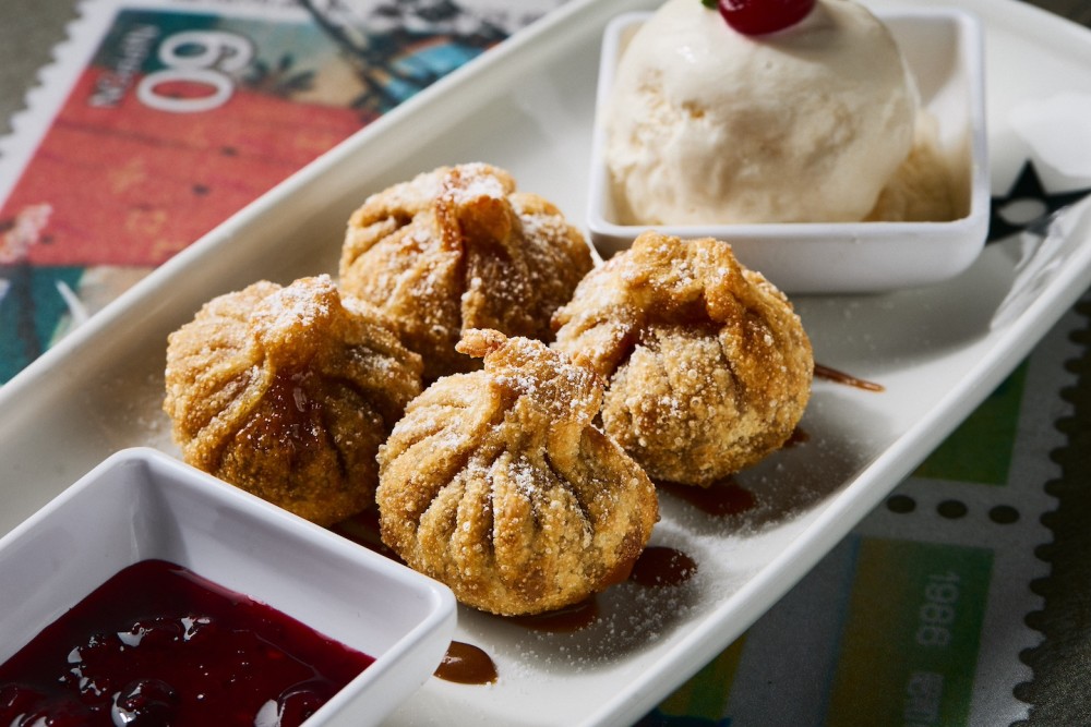 Crispy wontons, cheese, dulce de leche, vanilla ice cream, mixed berry sauce.