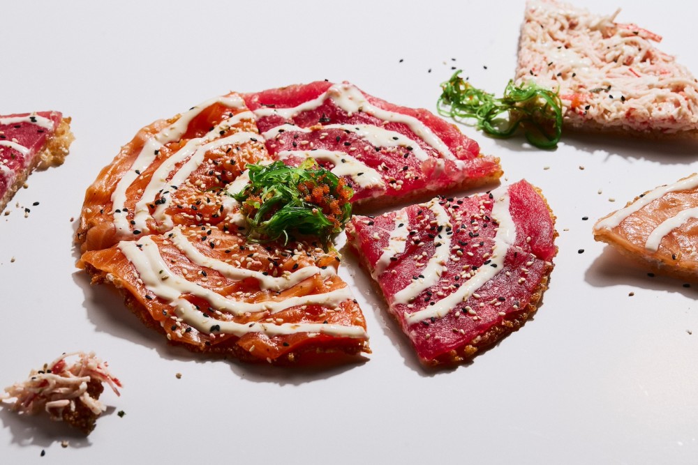 Toasted sushi rice base, cream cheese, choice of two toppings: salmon or kani.