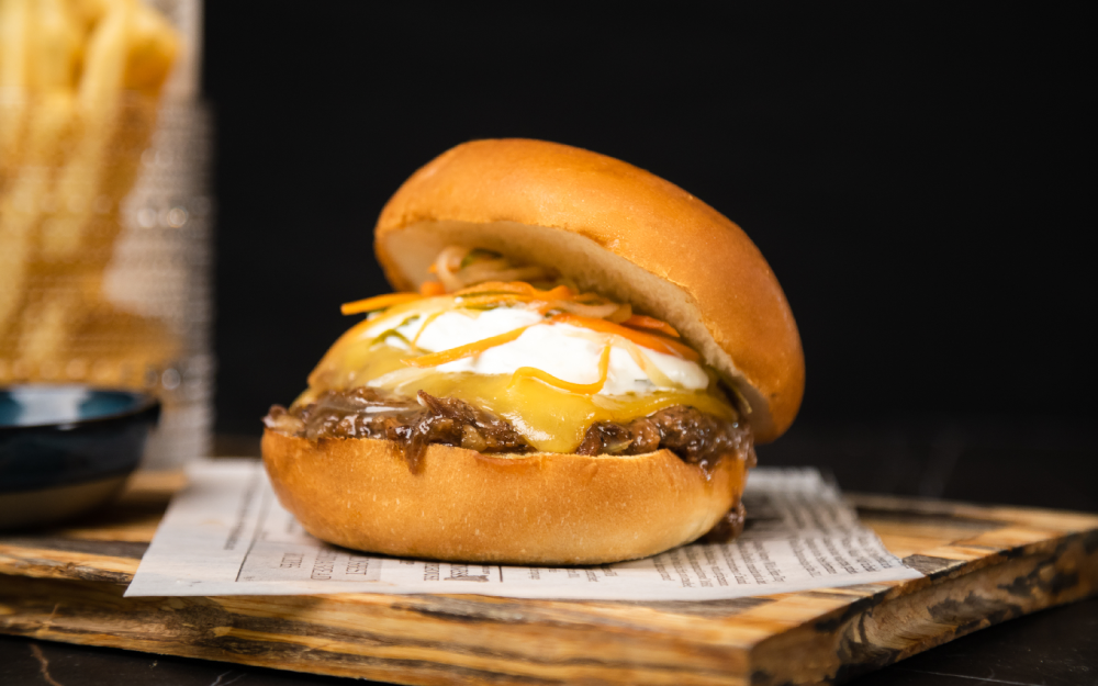 brioche, shredded short rib, tzatziki, gouda, pickled vegetables, fries