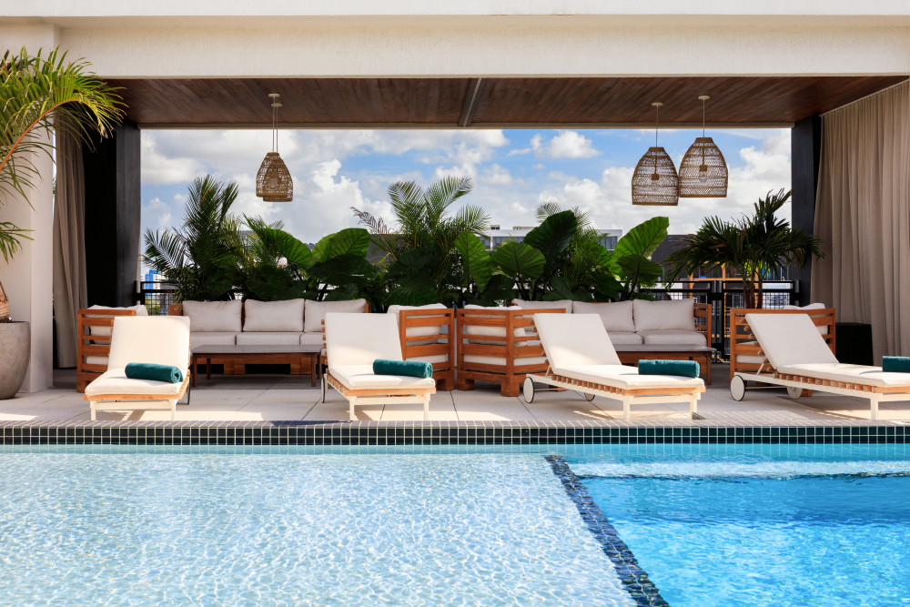Enjoy sun-soaked days and chic poolside vibes at Moxy Wynwood Hotel’s outdoor pool.
