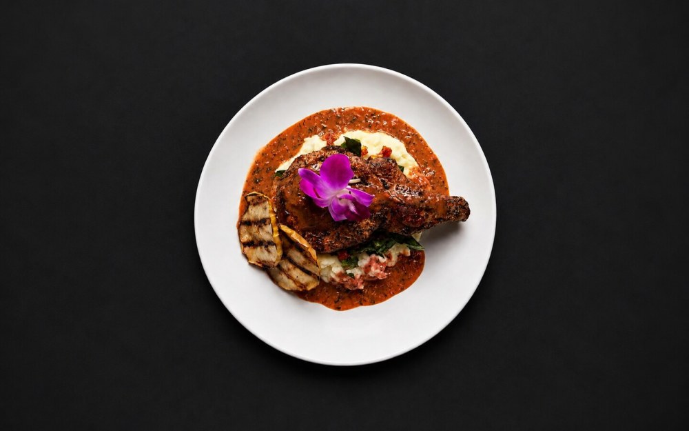 Guava - Bourbon Pork Chop, Sweet Potato Puree, Braised Greens, Charred Apple